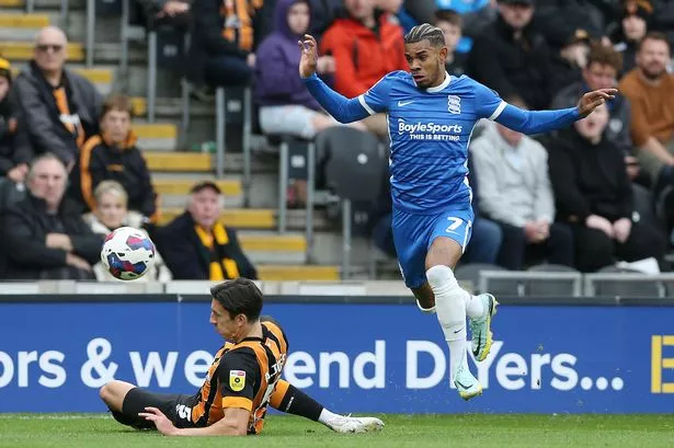 Hull Citys Alfie Jones And Birmingham Citys Juninho Bacuna